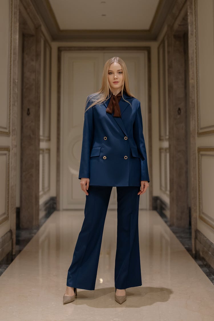 Woman In Blue Pant Suit