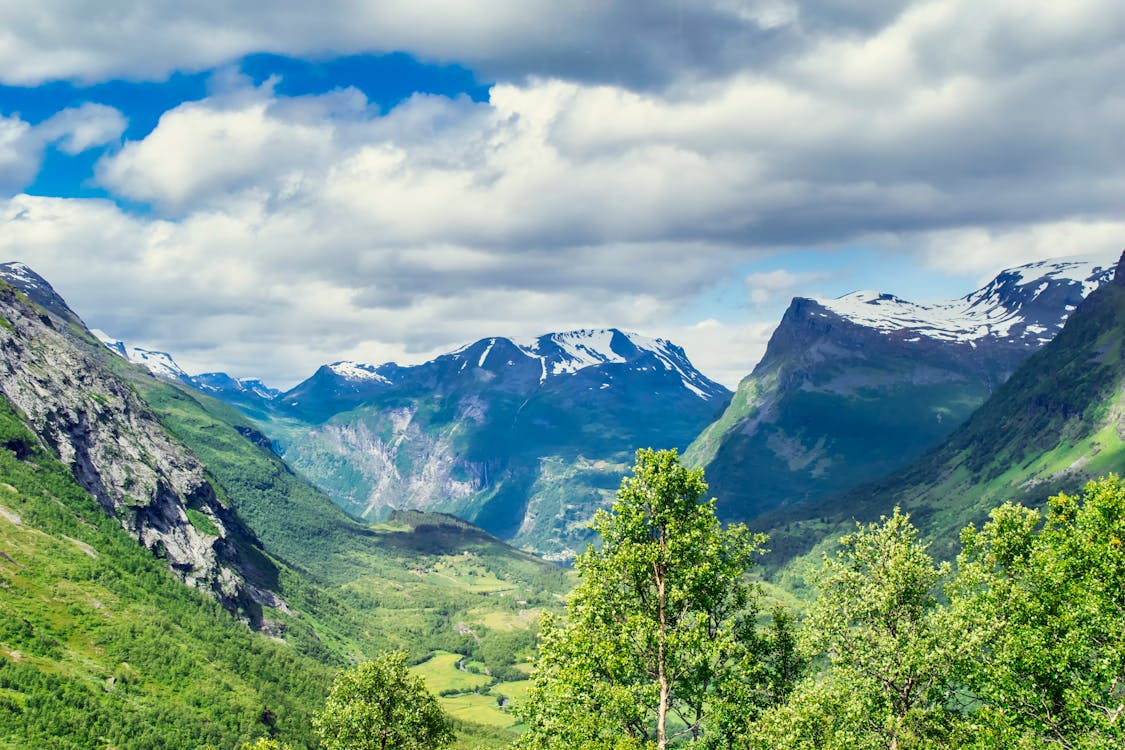 Mountains Under Cloudy Sky