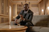 Man Pouring Whiskey on His Glass