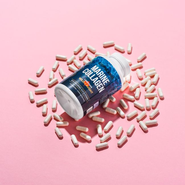 Korean middle-aged man taking vitamin supplements