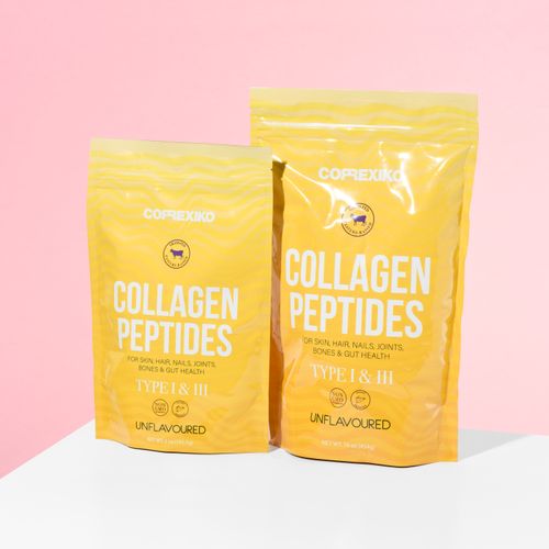Free Bright product shot of collagen peptide supplements with pink background. Stock Photo