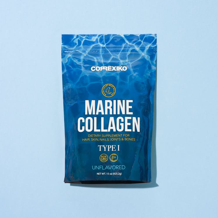 Collagen Supplement Product On Blue Background 