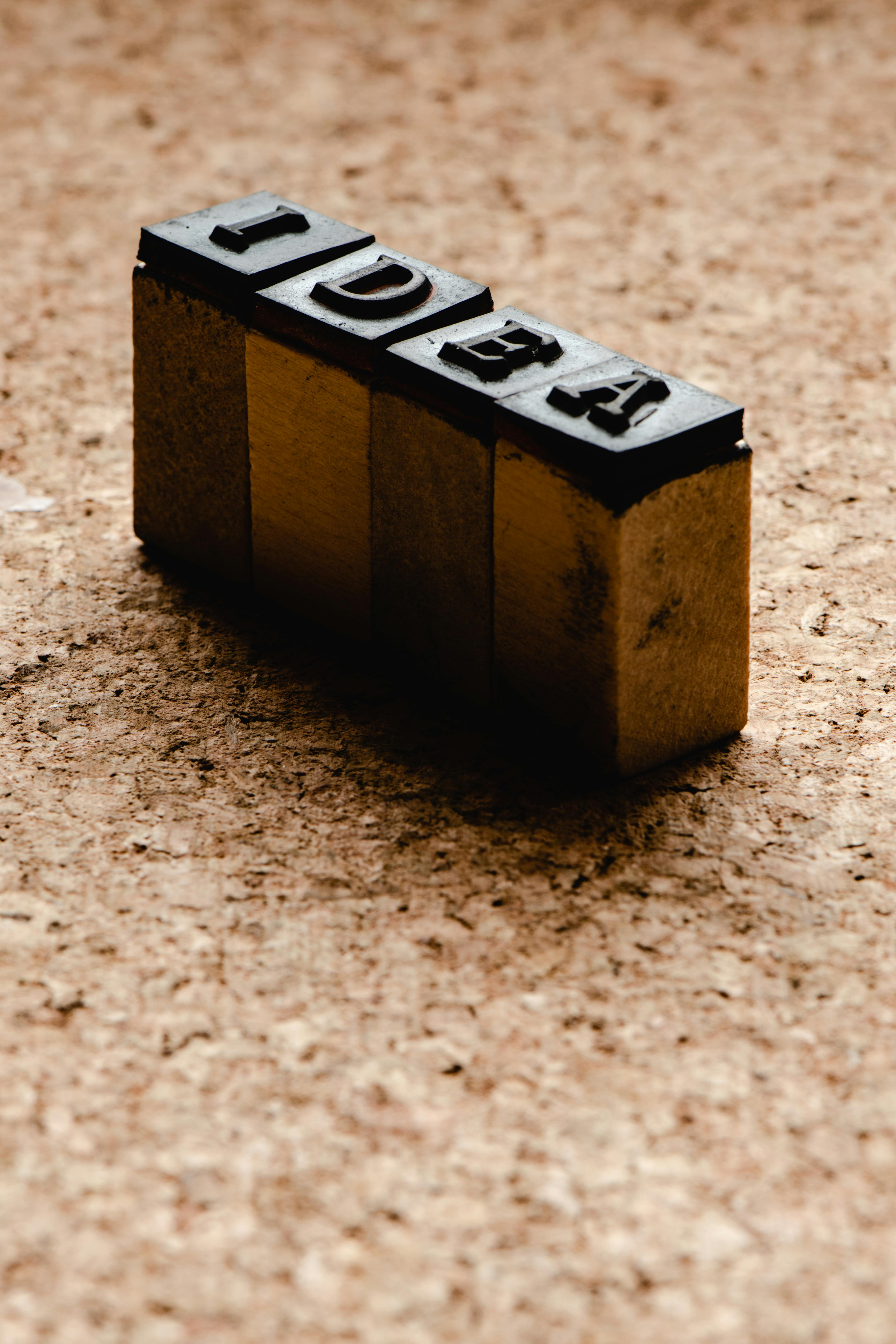 an idea stamp on a cork board