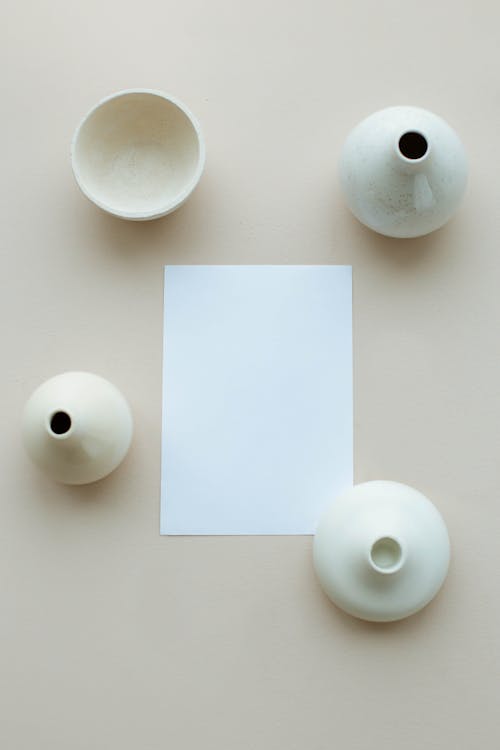Blank Paper and Ceramic Vases 