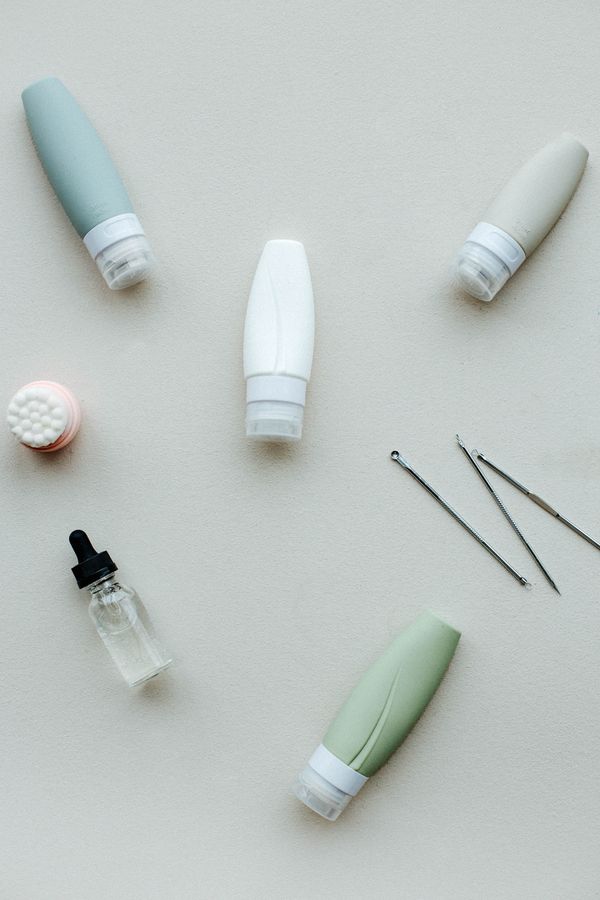 Overhead view of skincare products and tools — photo by Hanna Pad on Pexels
