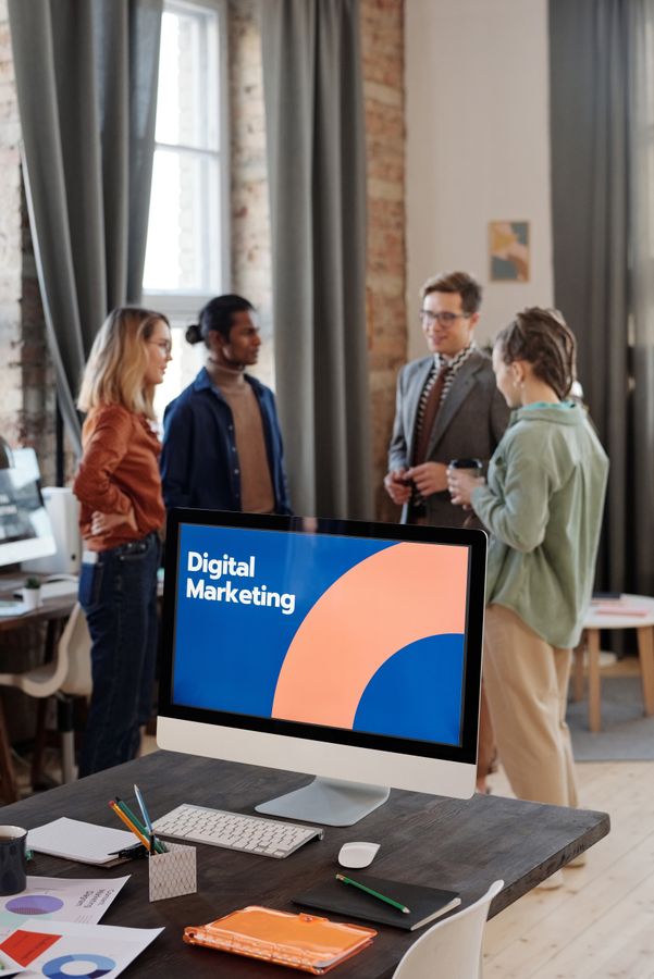 Digital marketing team collaborating in a modern office