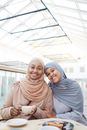 Woman in Gray Hijab Smiling