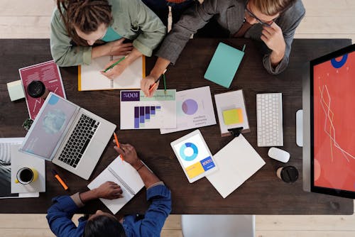 Free Team Having a Meeting Stock Photo