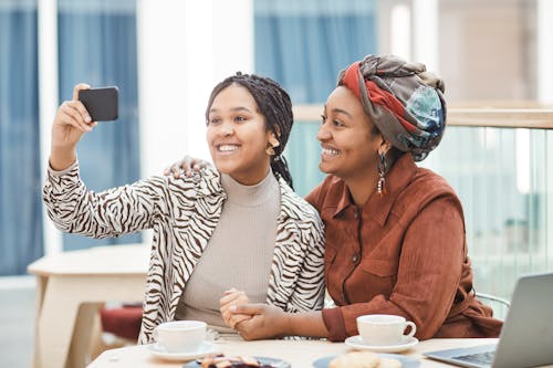 Two Women Taking Selfie