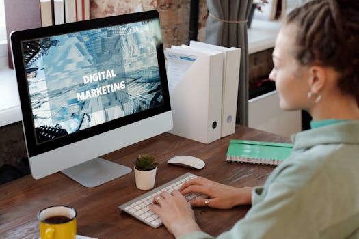 Professional woman engaged in digital marketing work at her home office desk.