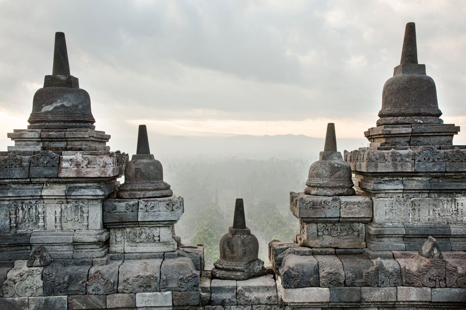 Hunting for the morning light over Borobudur's stupas before the mist lifts