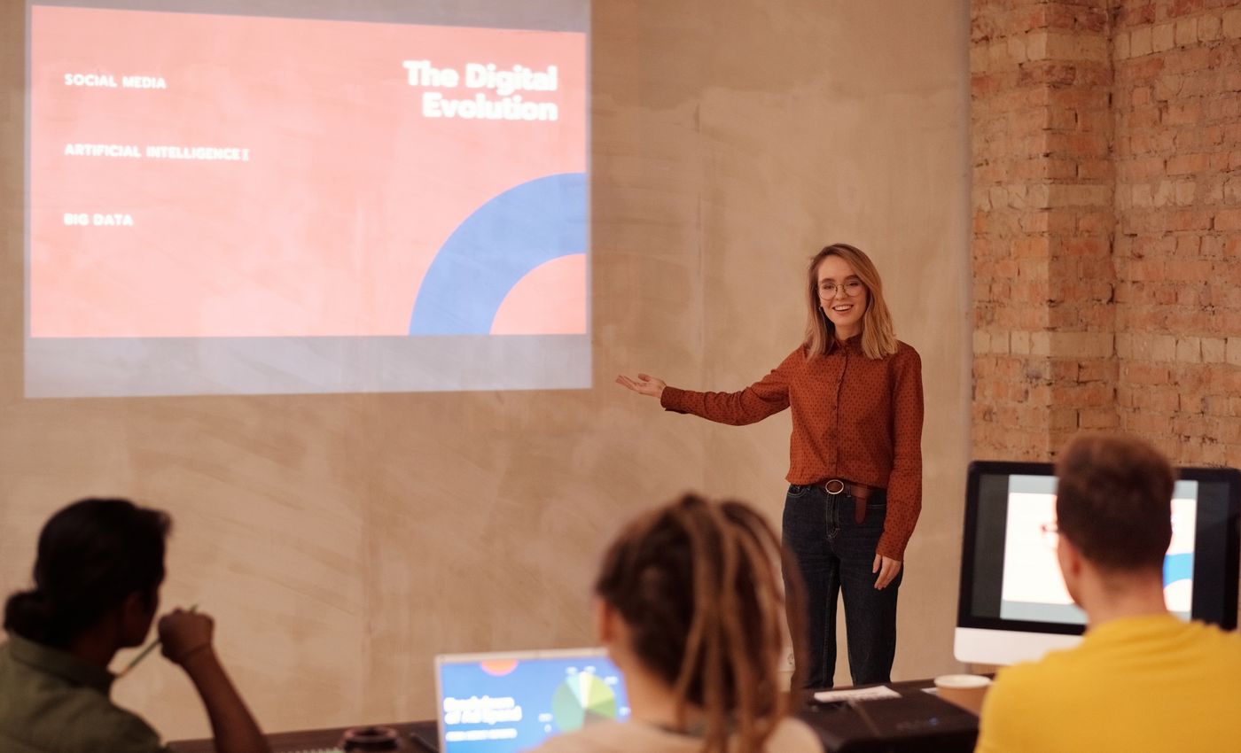 Professional facilitator delivering an interactive management training presentation