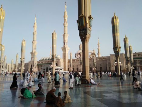 A serene day at Al-Masjid an-Nabawi in Medina, showcasing its stunning architecture and peaceful atmosphere.