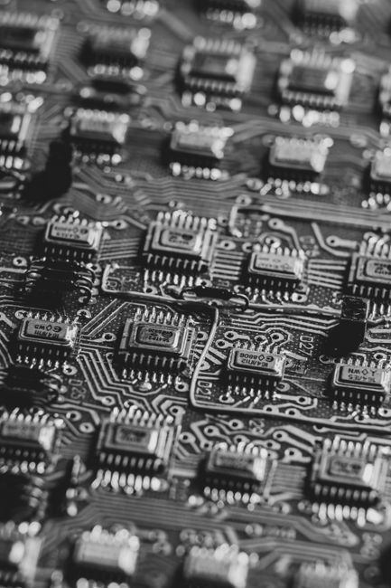 A close-up of a silicon wafer representing the Intel semiconductor business model.