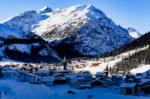 Village Near Snow Covered Mountain