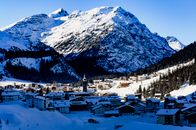 Village Near Snow Covered Mountain