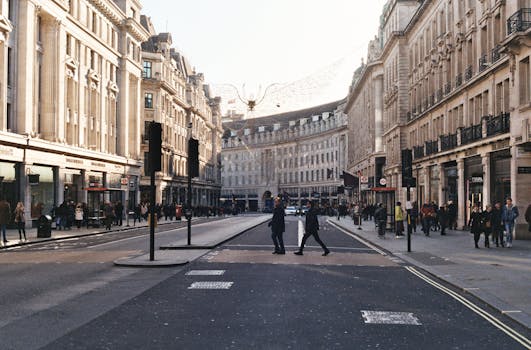 Street view of Regent Street in London with people and classic architecture.