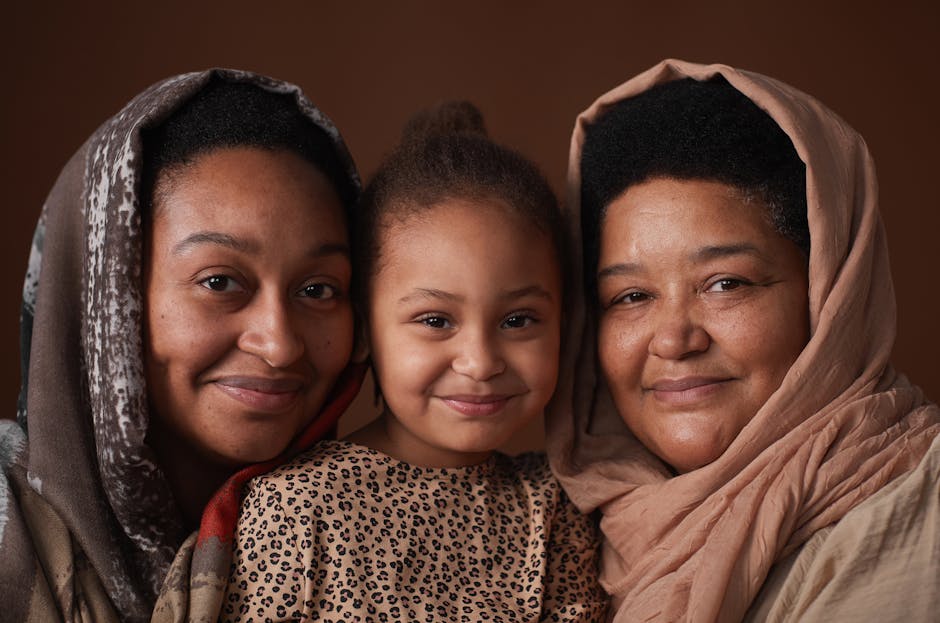 Three generations of women (grandmother, mother, daughter) smiling together, embracing. - mother and daughter relationship Three generations of women (grandmother, mother, daughter) smiling together, embracing. - mother and daughter relationship