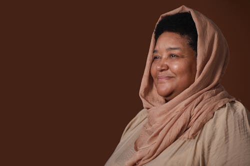 Photo of Woman Wearing Brown Headscarf