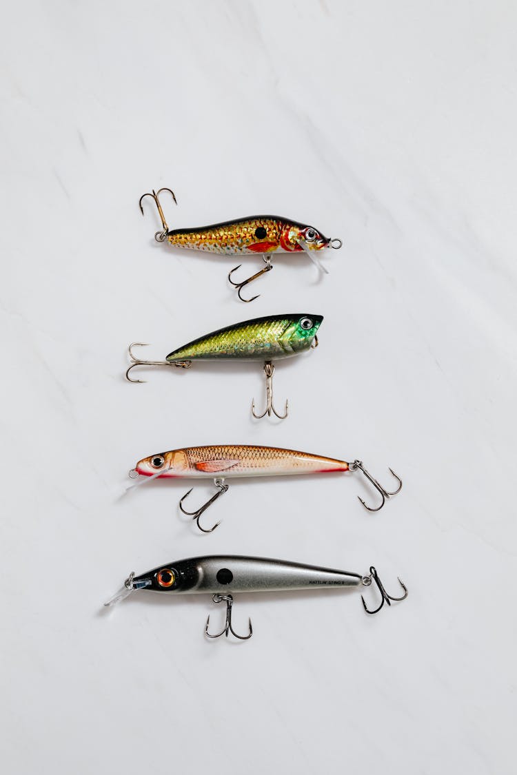 Fishing Lures On White Surface