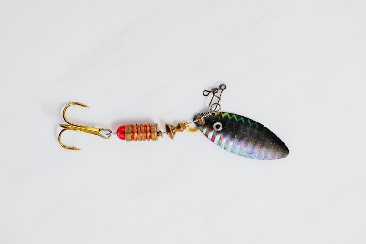 Fishing Lure On White Surface