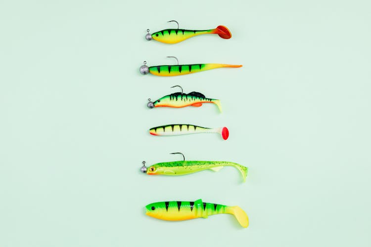 Fishing Lures On Green Surface