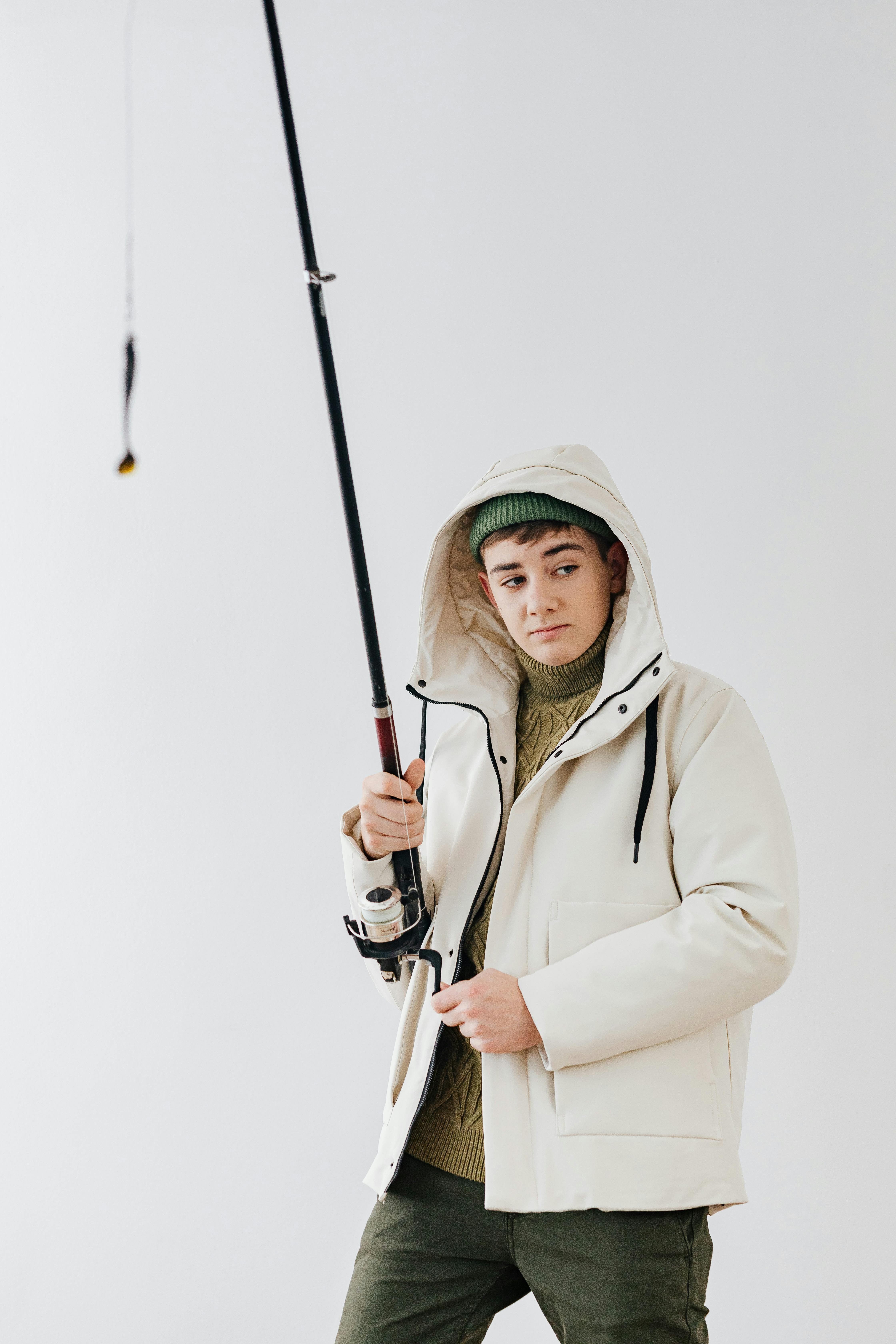 Boy Holding Fishing Rod · Free Stock Photo