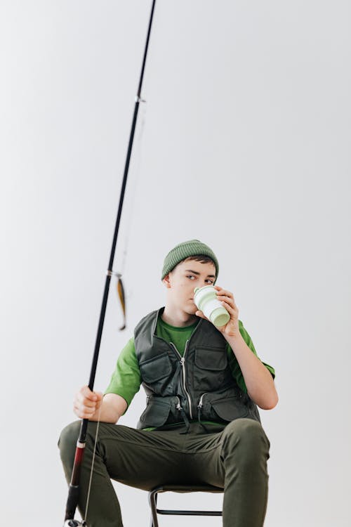 Studio Portrait of a Teenage Fisherman