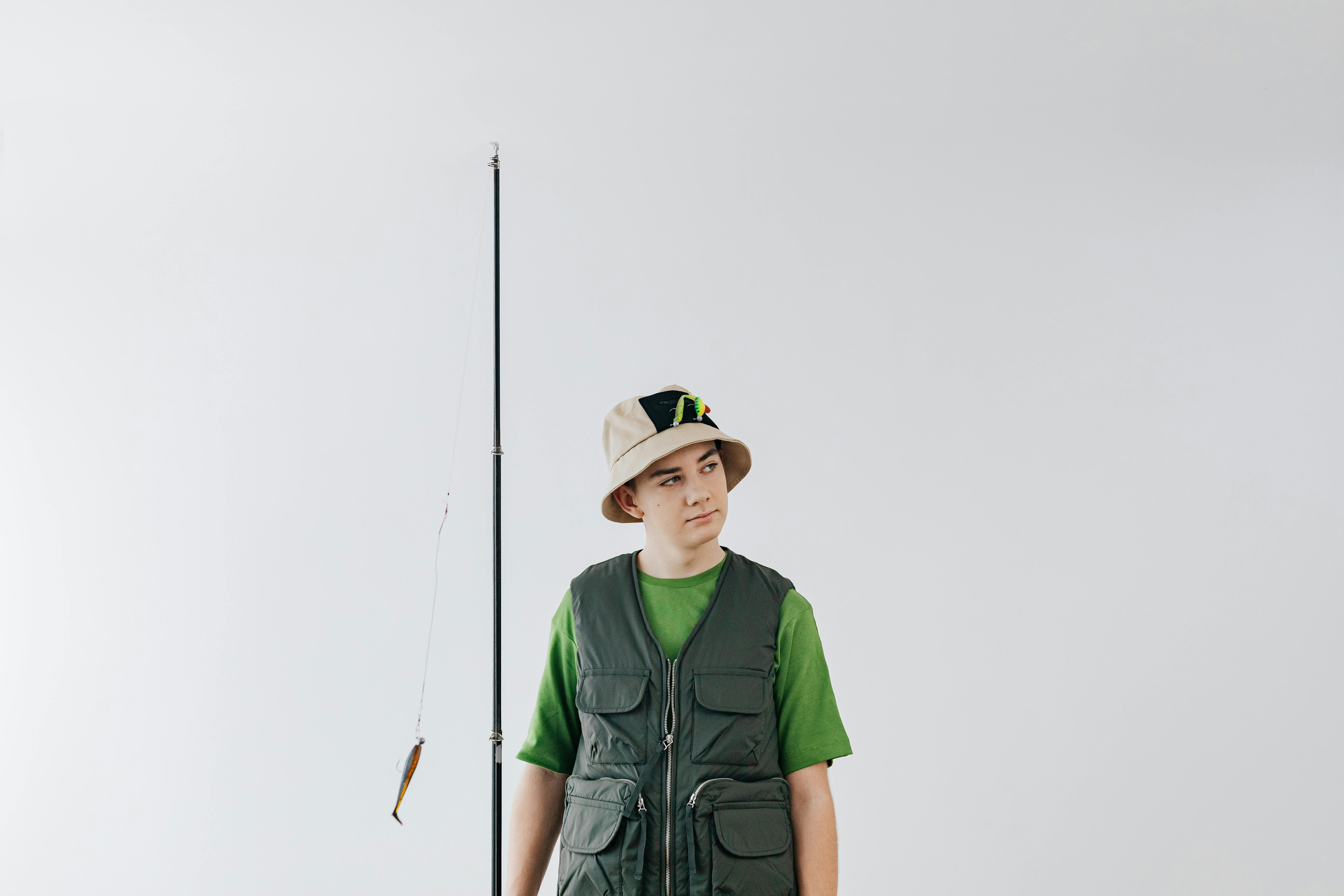 Boy Holding a Fishing Rod