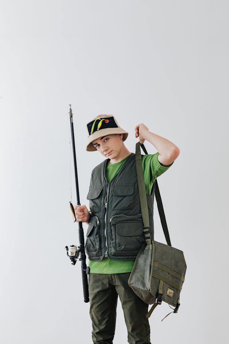 Boy Holding A Fishing Rod