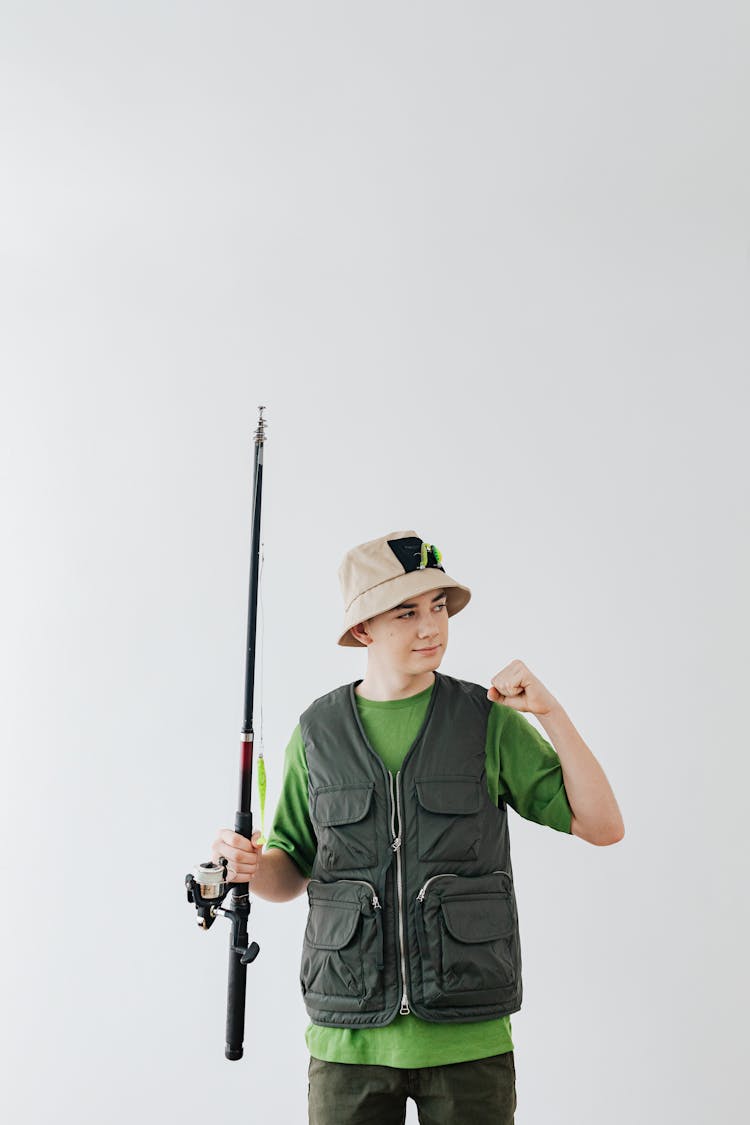 Boy Holding A Fishing Rod