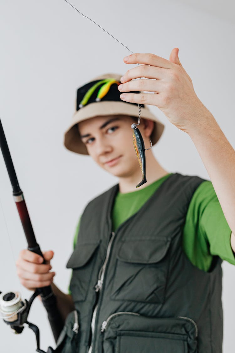 Boy Holding A Fishing Rod