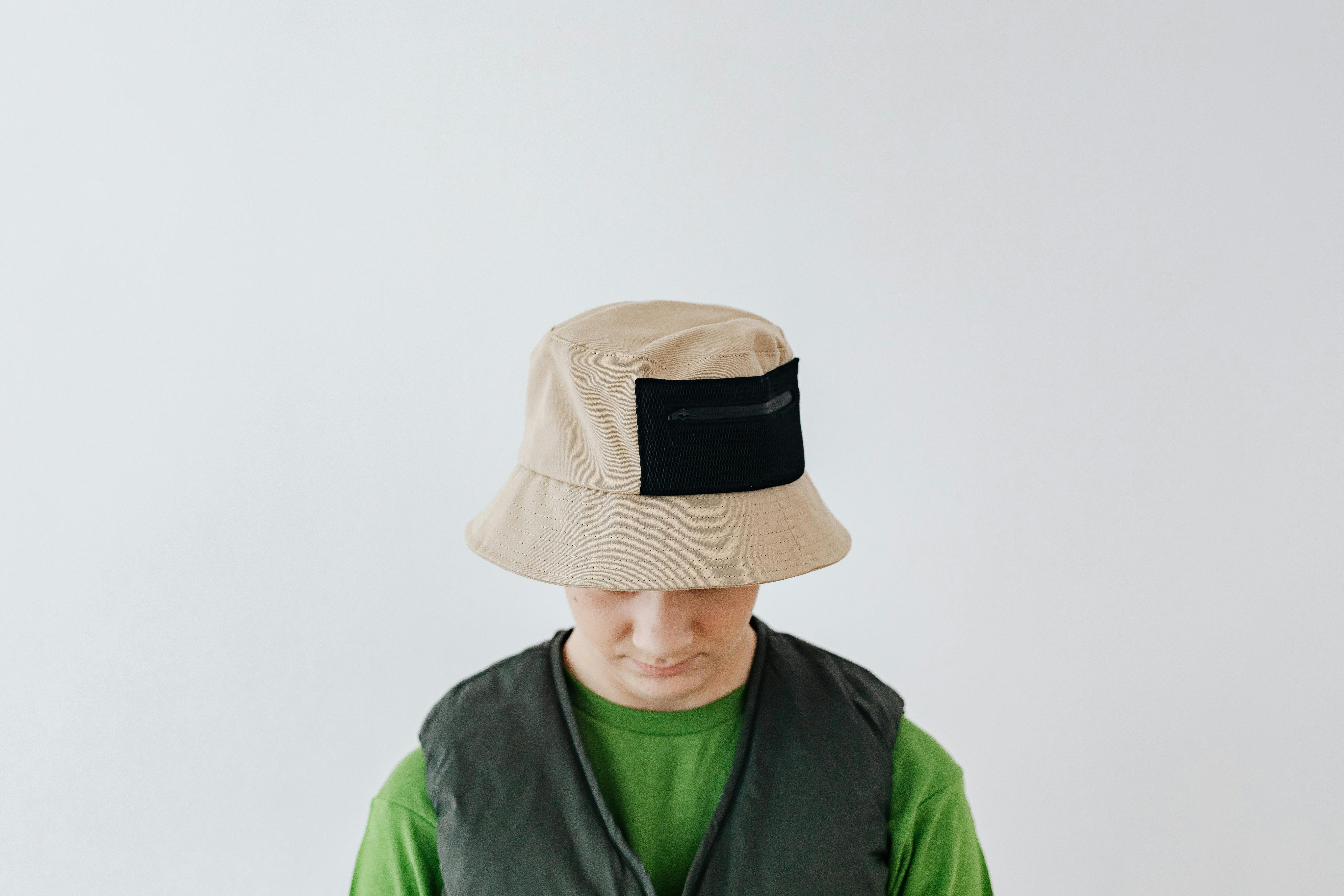 Boy Wearing a Bucket Hat · Free Stock Photo