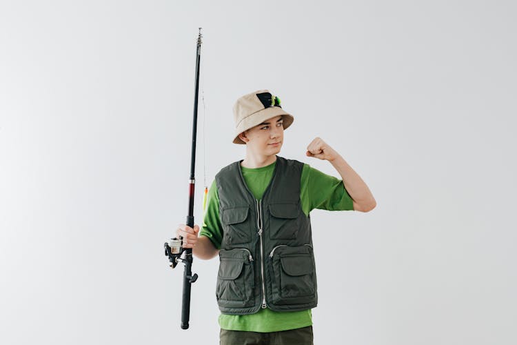 Boy Holding A Fishing Rod