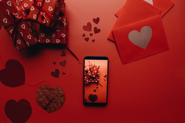 Phone, Love Letters And Gifts With A Heart Wrapping