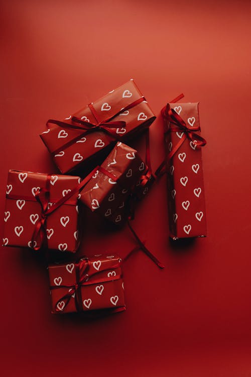 Free Red Gift Boxes on Red Surface Stock Photo
