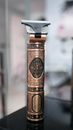 Brown and Black Metal Tube