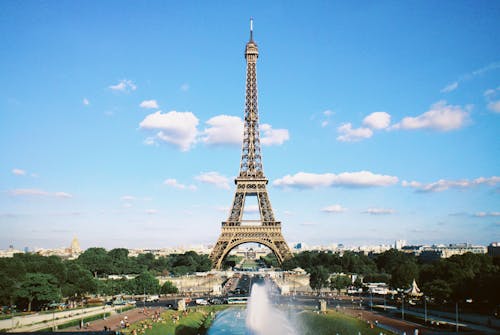 Photo of the Eiffel Tower Under a Blue Sky