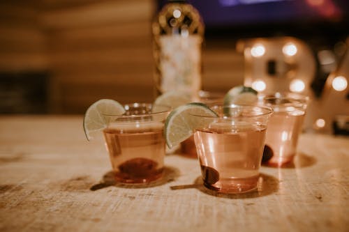 Free Glasses of tequila with lime and olives Stock Photo