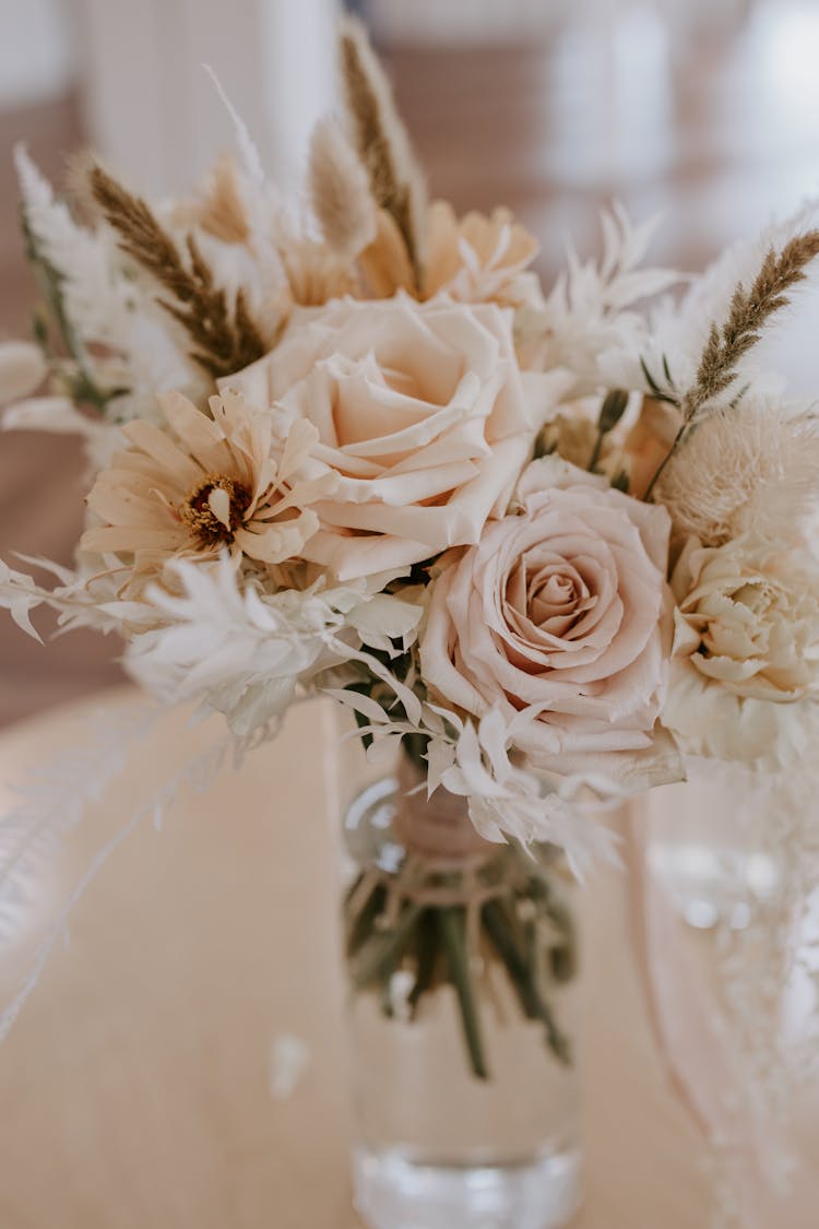 Blooming Flowers In Water In Vase