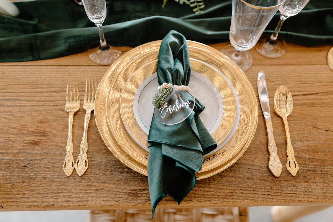 Free Table setting with elegant tableware and personalized napkin ring Stock Photo