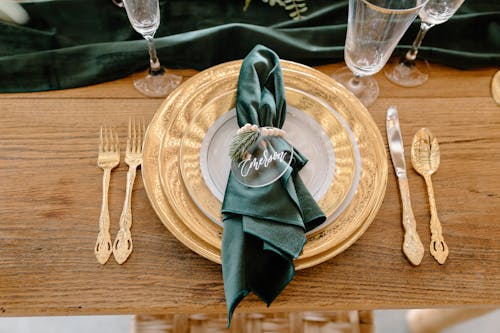 Free Table setting with elegant tableware and personalized napkin ring Stock Photo