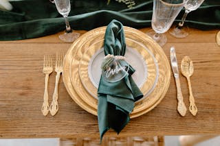 Table setting with elegant tableware and personalized napkin ring