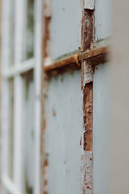 Corroded metal details on rustic old house