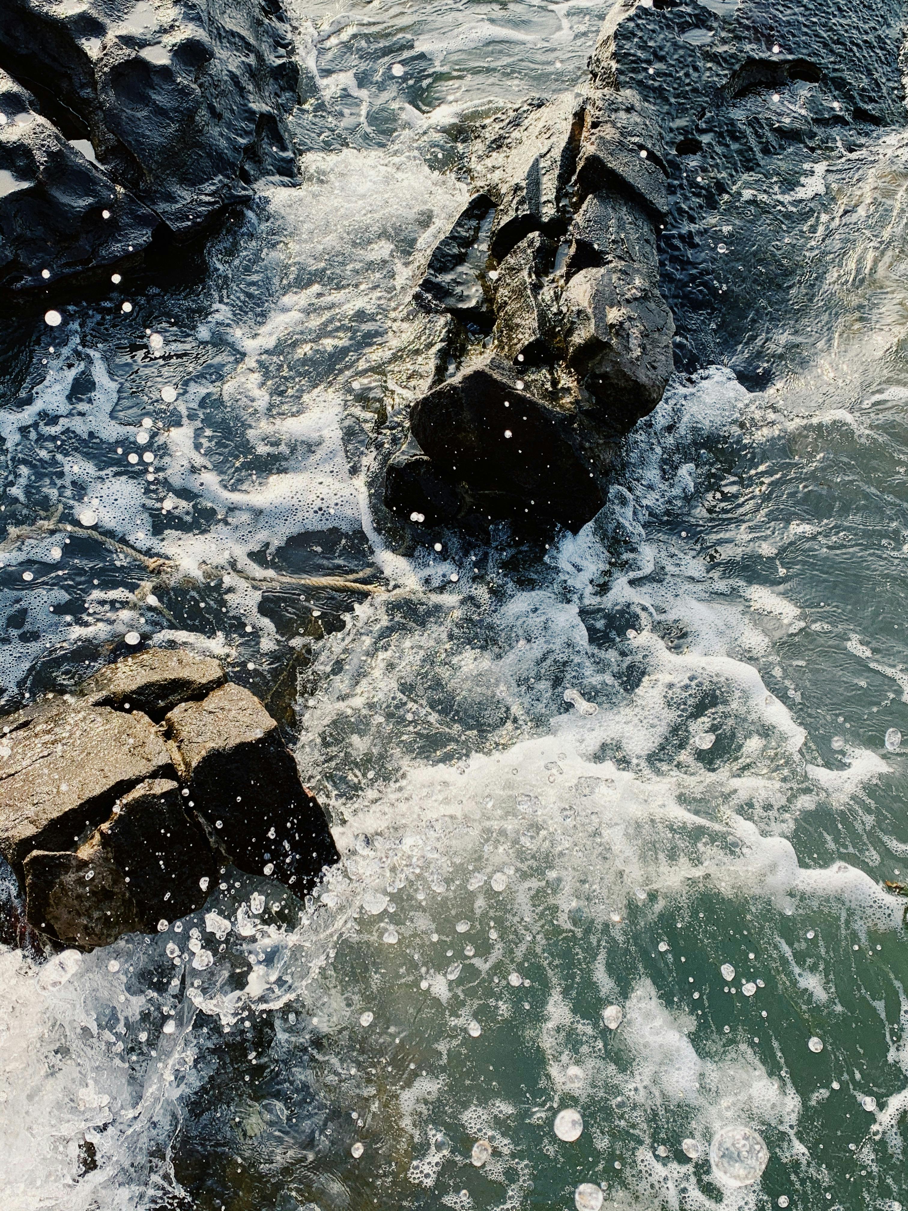 waves crashing on rocks