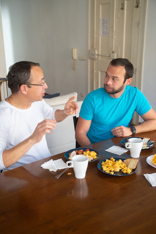 Men Having Breakfast