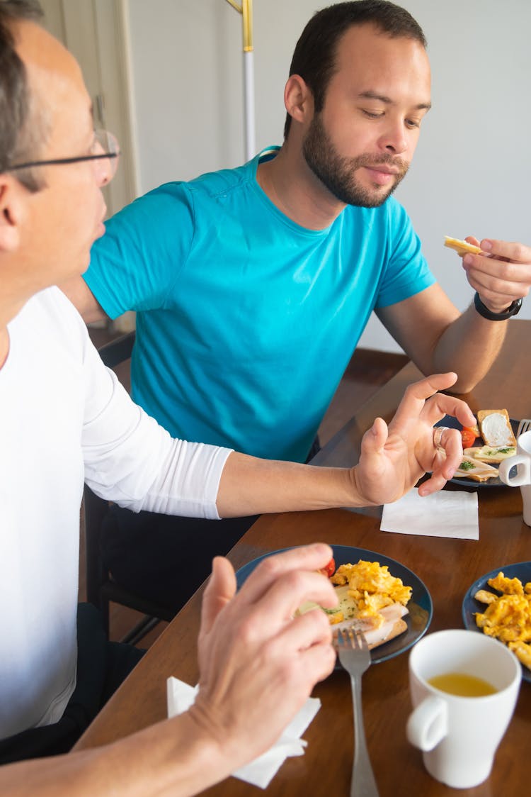 Men Eating Breakfast