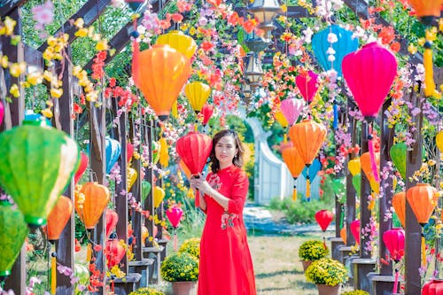 Free Woman with Traditional Colorful Lanterns Stock Photo