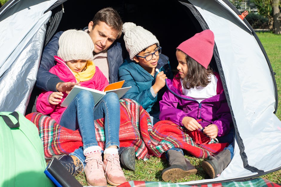 family happily camping in a large cabin-style tent - fancy camping tents family happily camping in a large cabin-style tent - fancy camping tents