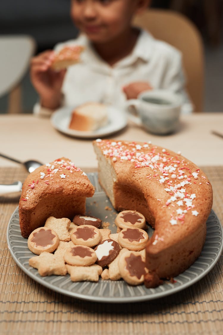 Cake And Cookies On Ceramic Plate